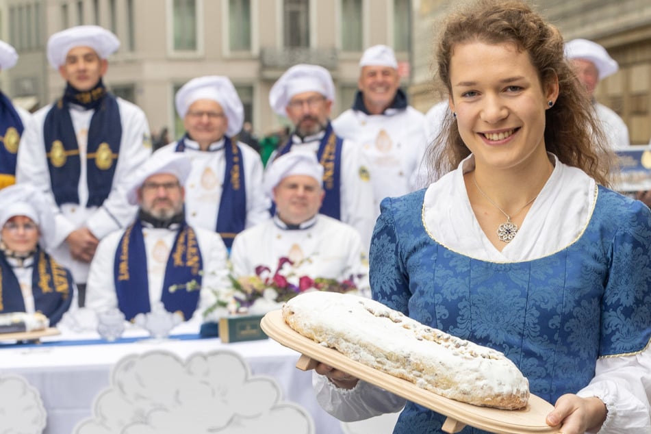 Stollenmädchen Lorna Prenzel (22) hält den Dresdner Christstollen in ihren Händen - und damit eine "Marke des Jahrhunderts".