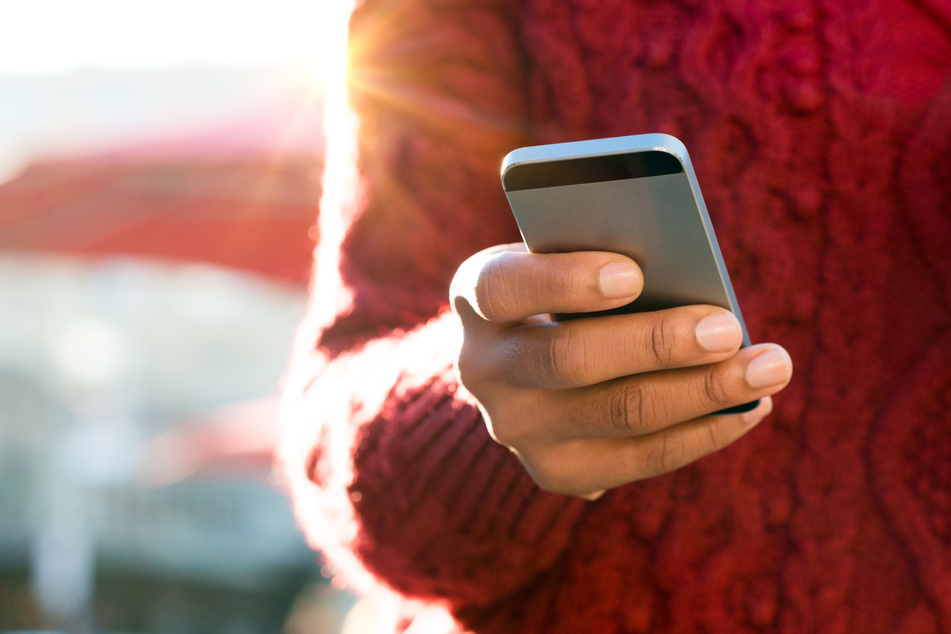 Heat can damage your device's screen and battery (stock image).