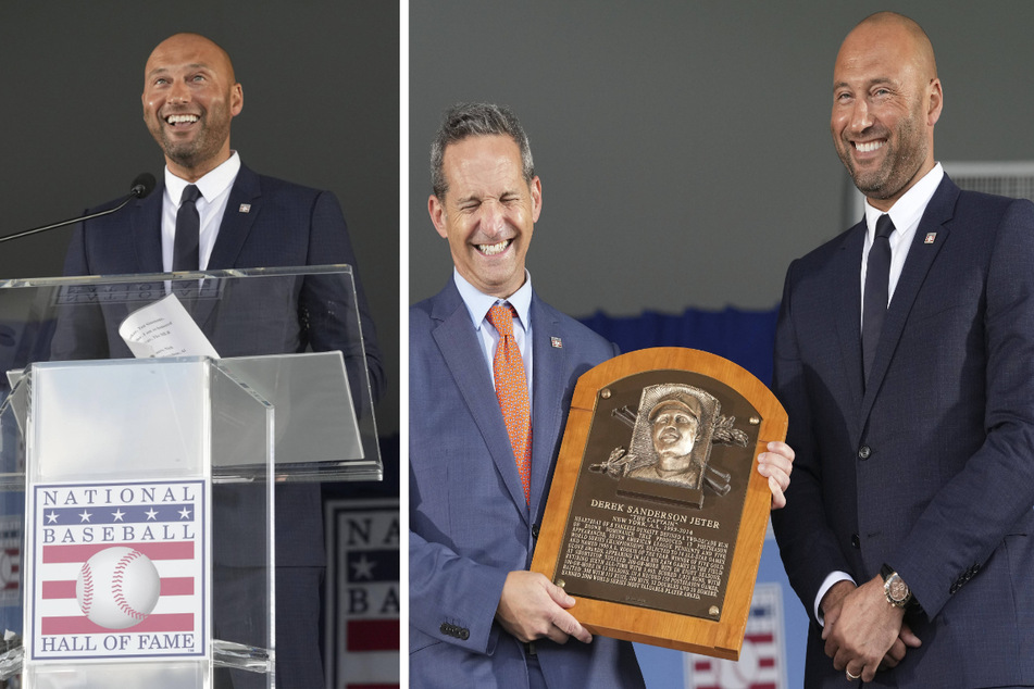 Derek Jeter (r.) was presented with his Hall of Fame plaque by Hall of Fame President Jeff Idelson (c.) during the 2021 Induction Ceremony on Wednesday.