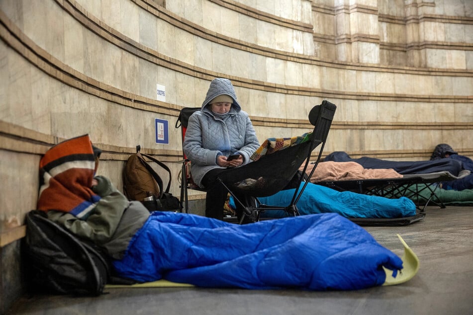 People shelter in a metro station during Russian missile and drone attacks in Kyiv, Ukraine, on February 3, 2026.