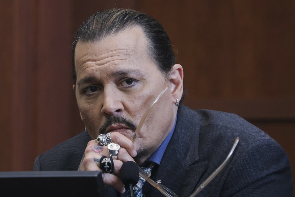 Depp maintained his innocence while being questioned for the second time during the explosive trial.