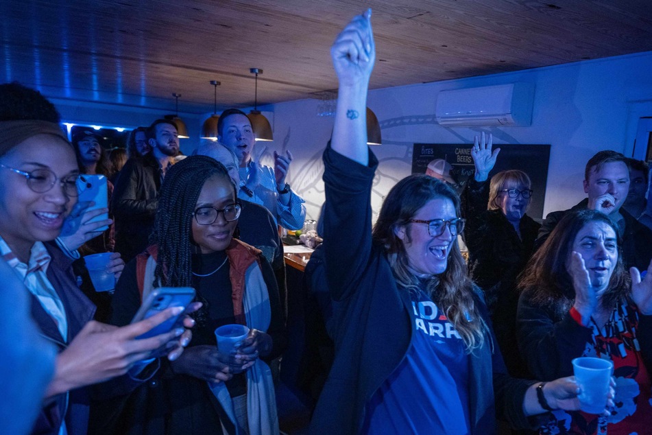 Campaign volunteers celebrated during a campaign watch party in North Charleston, South Carolina, on Saturday after Joe Biden was the projected winner of the 2024 South Carolina Primary.