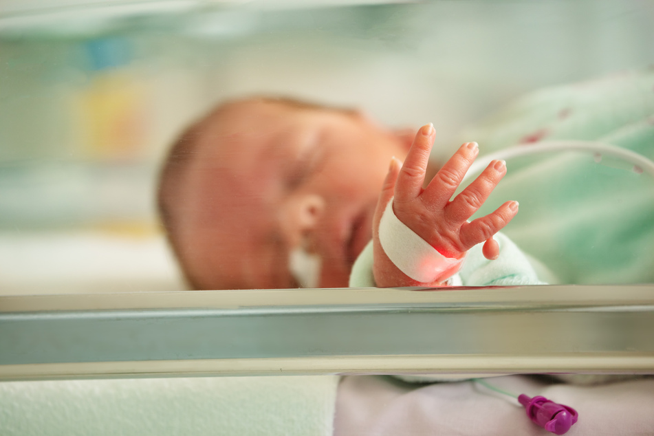 The new mom suffered a serious shock when she held her baby for the first time (stock image).