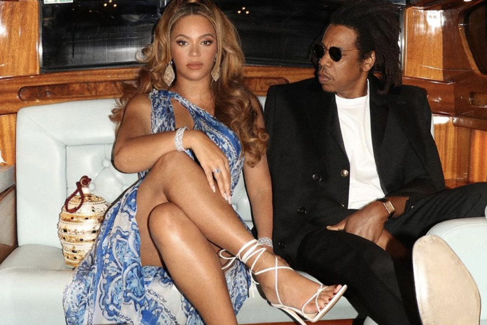 Beyoncé and Jay-Z pose while on a boat together.