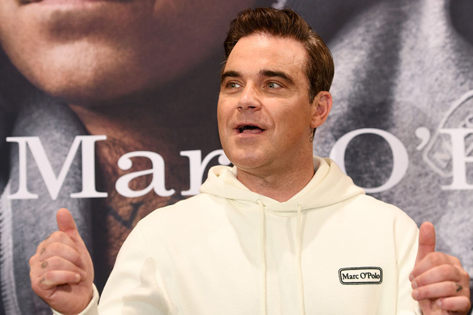 Robbie Williams (43) Sänger, Entertainer und Frauenheld?