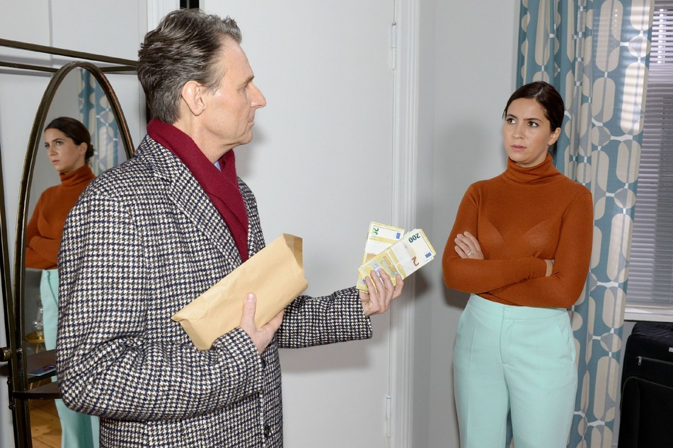 Jo Gerner macht Laura ein unmoralisches Angebot.