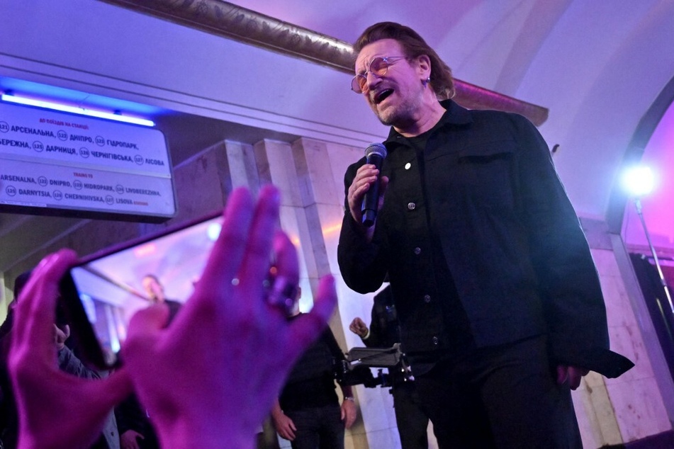 U2 frontman Bono performing in the Khreschatyk metro station in Kyiv, Ukraine.