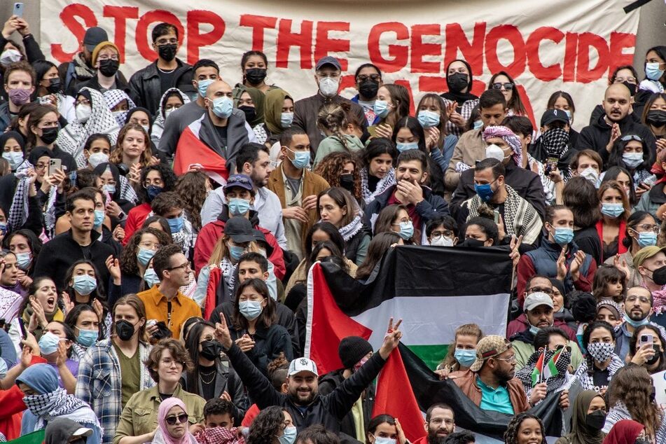 Supporters of Palestinian liberation rally at Harvard University in Cambridge, Massachusetts, amid Israel's ongoing bombing campaign of Gaza.