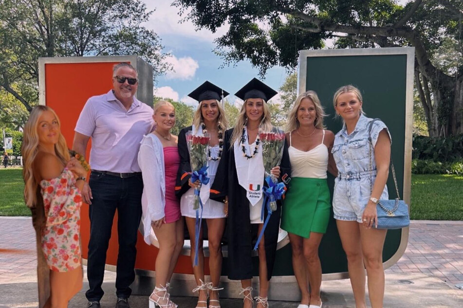 Haley and Hanna Cavinder (c) accomplished a major milestone this year by graduating from the University of Miami.