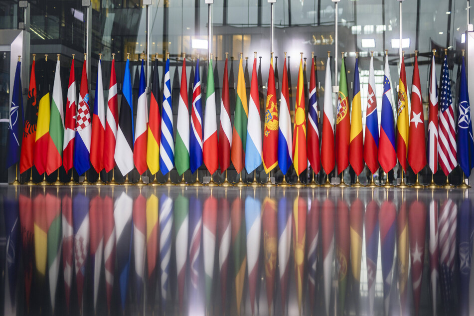 Flags in the main hall at NATO headquarters in Brussels.