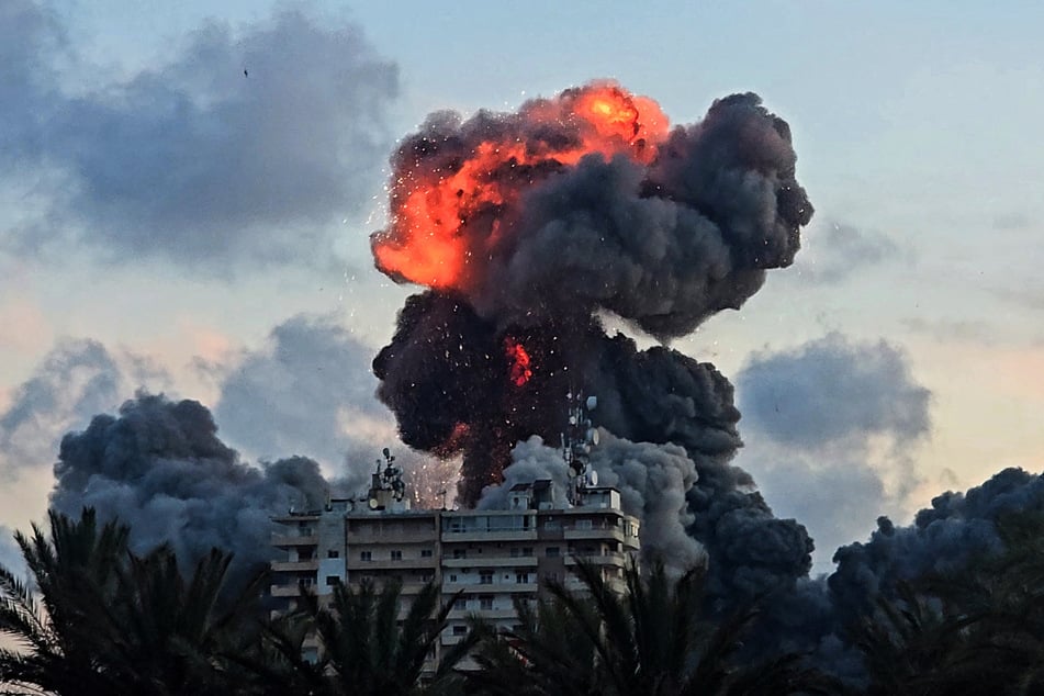 A fireball and smoke erupt from a building following an Israeli strike in Tyre, southern Lebanon, on May 28, 2026.