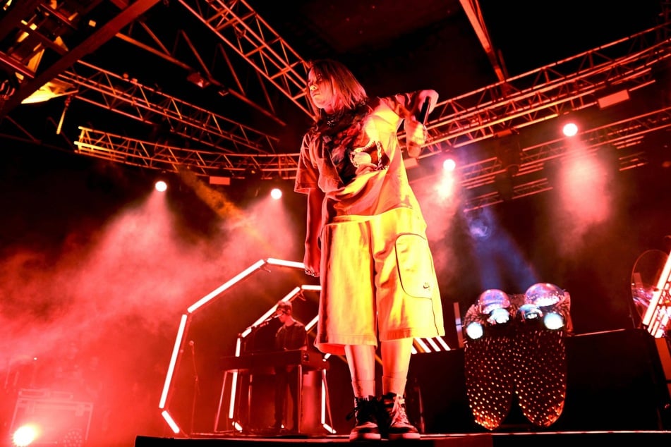Billie Eilish in concert in 2019. Her choice of baggy clothes to hide her body was her choice, she says, just as much as corsets and hosiery (archive image).