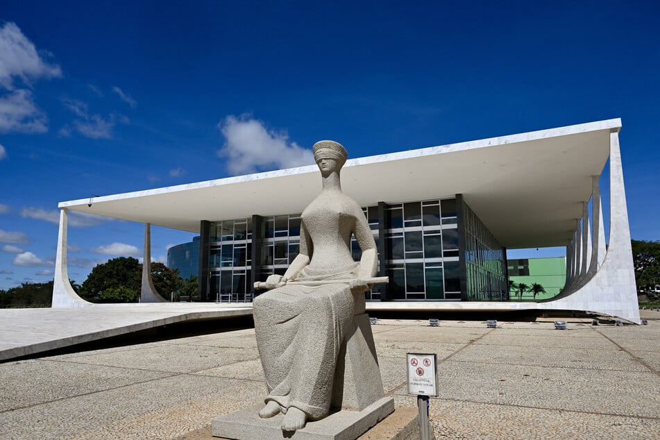 A sculpture is pictured at the entrance of the Brazilian Supreme Court building where the courtrooms are located in Brasilia.