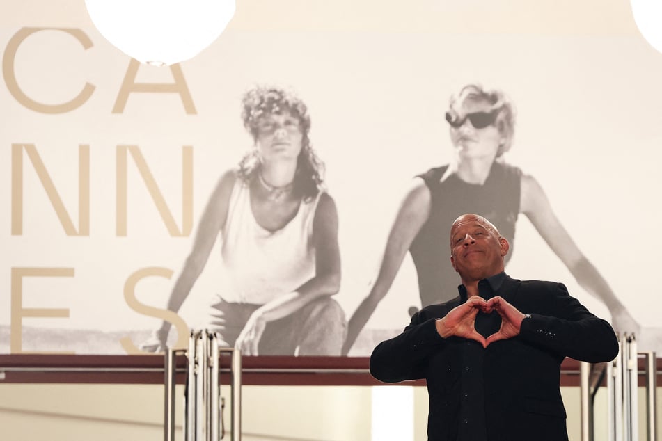 Vin Diesel gestures as he arrives for the screening of The Fast and the Furious at the 79th edition of the Cannes Film Festival on May 13, 2026.