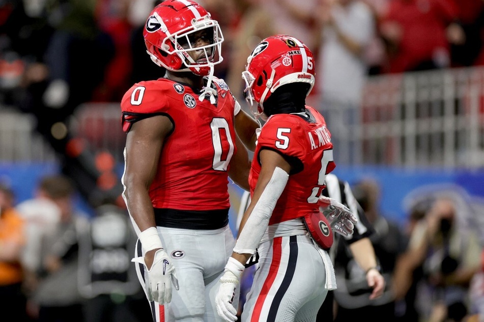 Tight end Darnell Washington (l) is a leading Georgia player whose status remains a question over whether he will play in the College Football National Championship game on Monday.