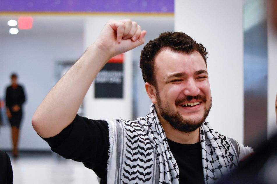 Mahmoud Khalil reacts as he arrives to Newark airport in New Jersey, after his release from ICE detention, on June 21, 2025.