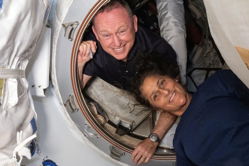 Veteran astronauts Butch Wilmore (l.) and Suni Williams arrived at the ISS in June aboard Boeing's Starliner spacecraft and were due to spend only eight days on the orbiting laboratory.