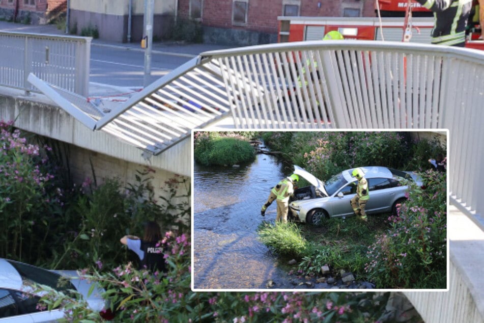 Audi fährt durch Straßengeländer und landet im Fluss