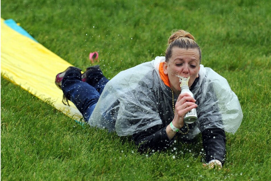 This MDWer is enjoying her drinks, and the Slip 'N Slide at the same time. Multitasking FTW!