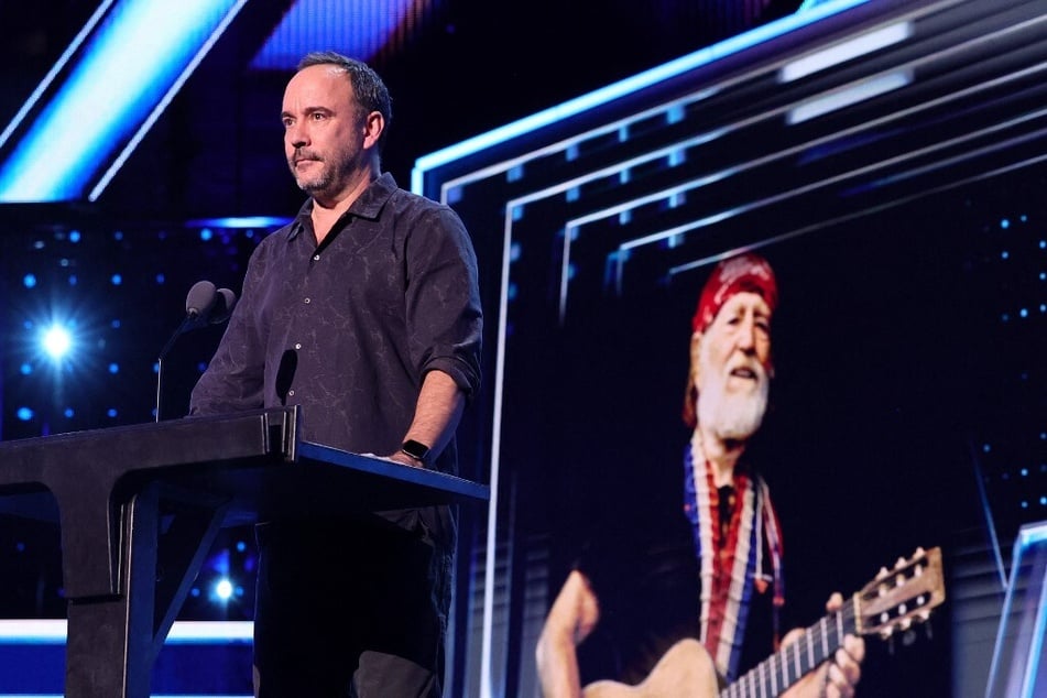 Dave Matthews speaks onstage about Willie Nelson during the 38th Annual Rock &amp; Roll Hall Of Fame Induction Ceremony.