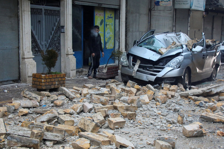 The damaged vehicle following an earthquake in Azaz, Syria.