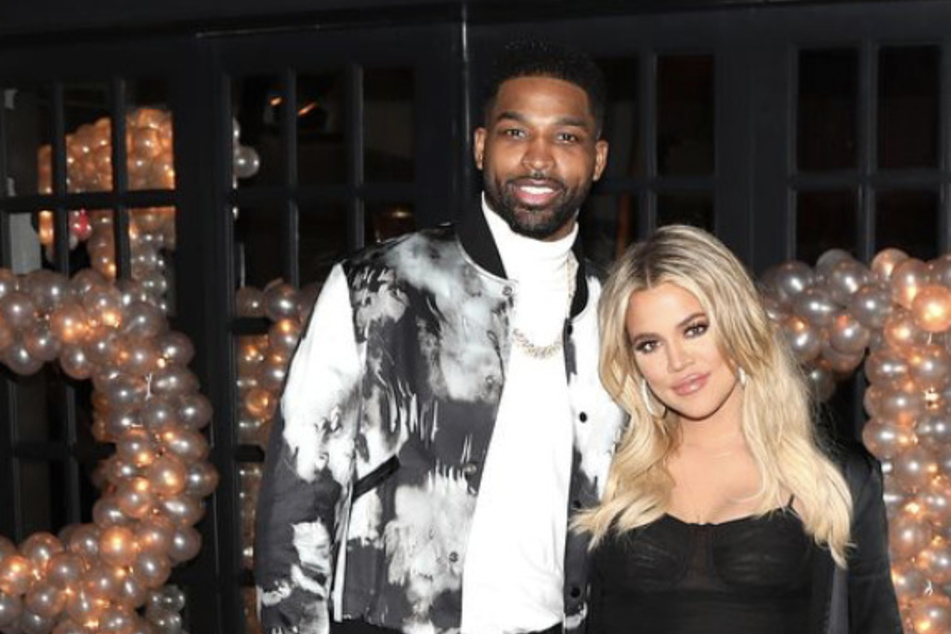 Khloé Kardashian (r.) and Tristan Thompson reportedly aren't labeling their relationship despite him accompanying his ex to her sister's engagement dinner.