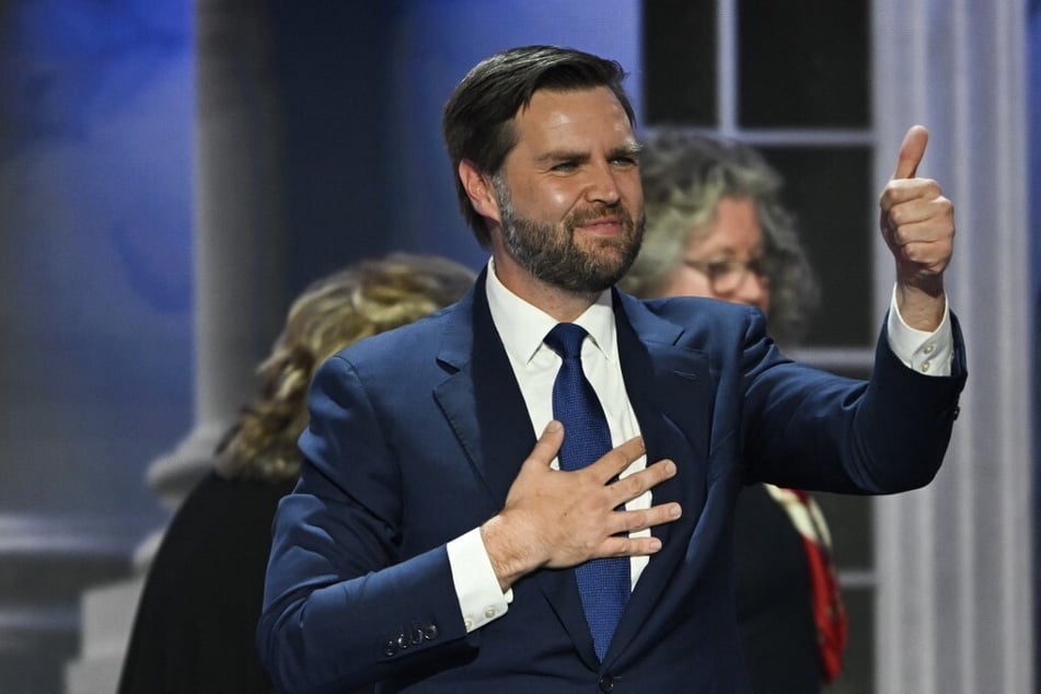 Donald Trump's running mate J.D. Vance gives a thumbs up after finishing his remarks during the third day of the 2024 Republican National Convention.