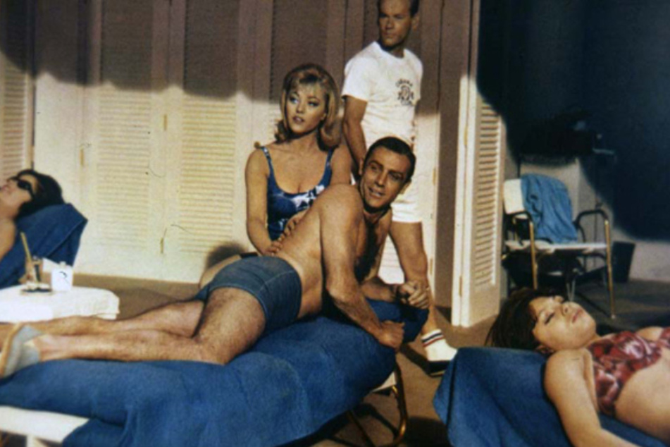 Margaret Nolan and Sean Connery (m) n the film James Bond 007 - Goldfinger.