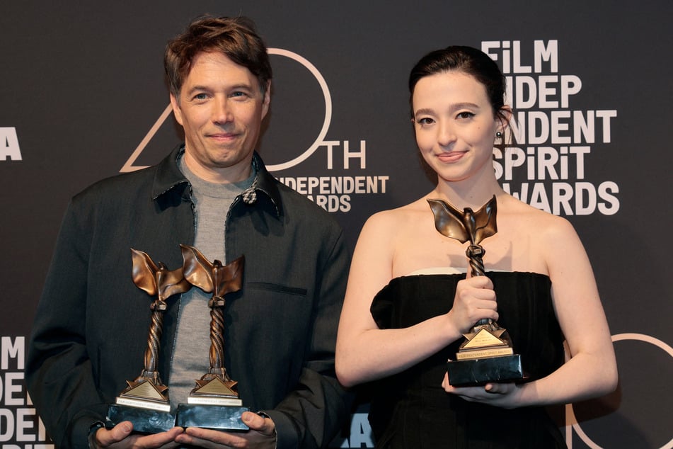 Anora director Sean Baker (l.) delivered an impassioned plea to "keep indie film alive" as he won the top prize at the Spirit Awards Saturday.