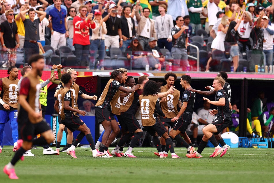 Canada's Stephen Eustaquio and his teammates celebrate scoring against South Africa in their Round of 32 match on June 28, 2026.