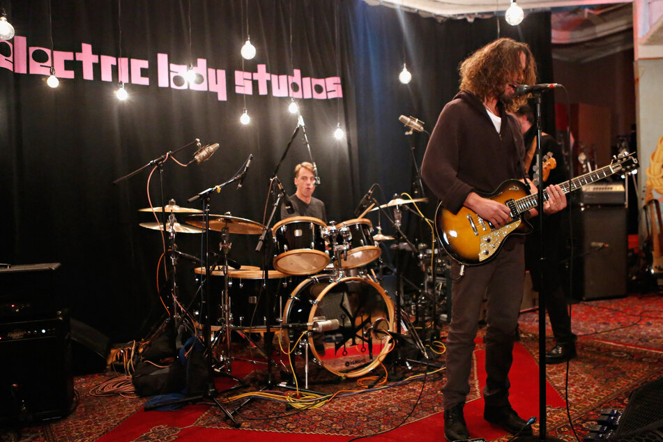 The band Soundgarden performs during SiriusXM's Town Hall With Soundgarden at Electric Lady Studio on November 14, 2012, in New York City.
