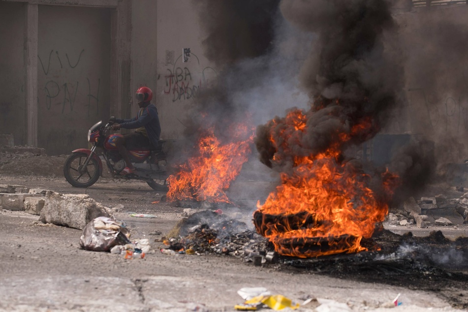 Barricades burning in Port-au-Prince, Haiti, during a day of protests following the kidnapping of the 17 missionaries.