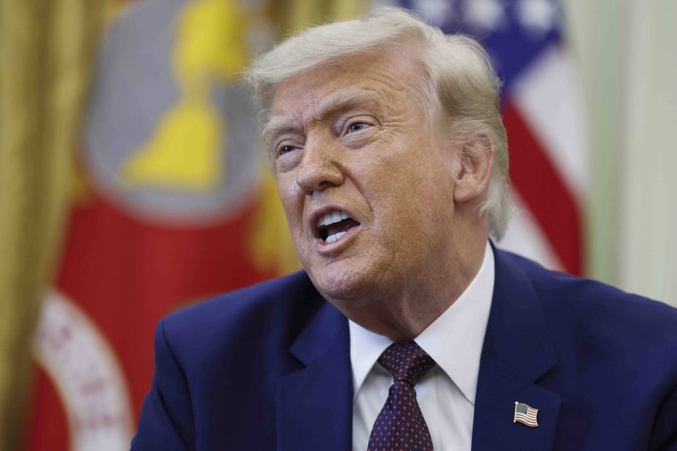 President Donald Trump stripped job protections from about 8,000 federal employees by redefining their positions as "at-will."