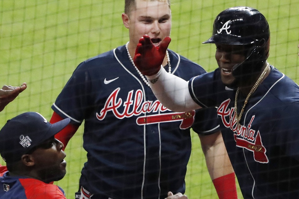 World Series: The Braves blast off early with a little history to beat the Astros in game one