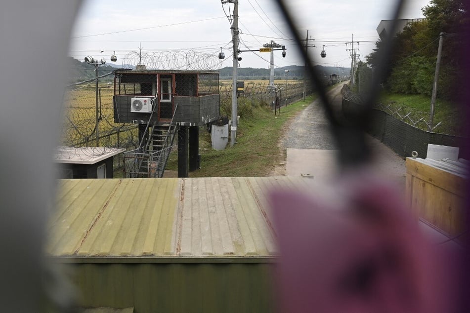 A South Korean military guard post is seen through a military fence from the Imjingak peace park near the Demilitarized Zone dividing the two Koreas.