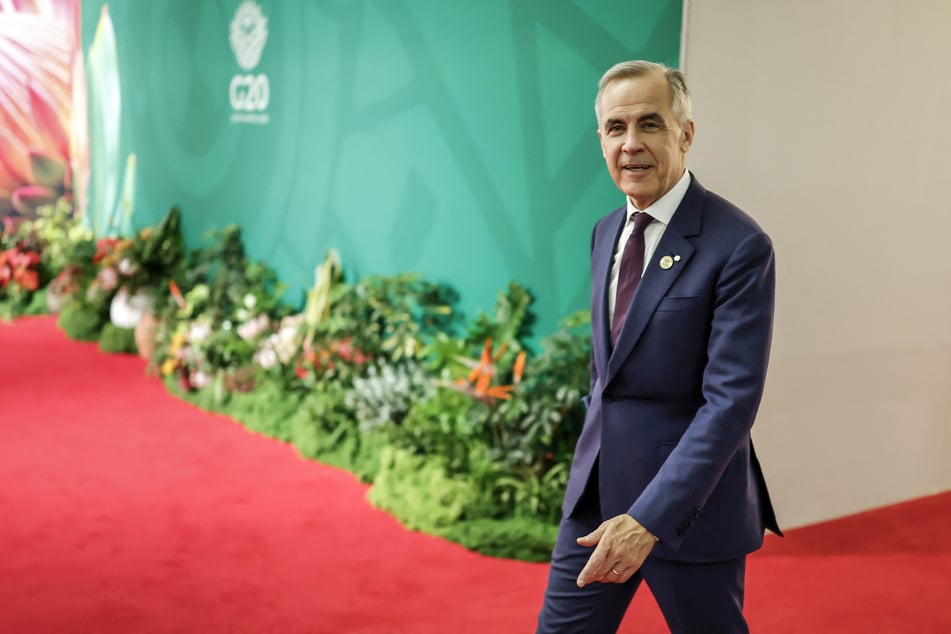 Canada's Prime Minister Mark Carney considering a trip to Washington DC to attend the draw for the FIFA World Cup.