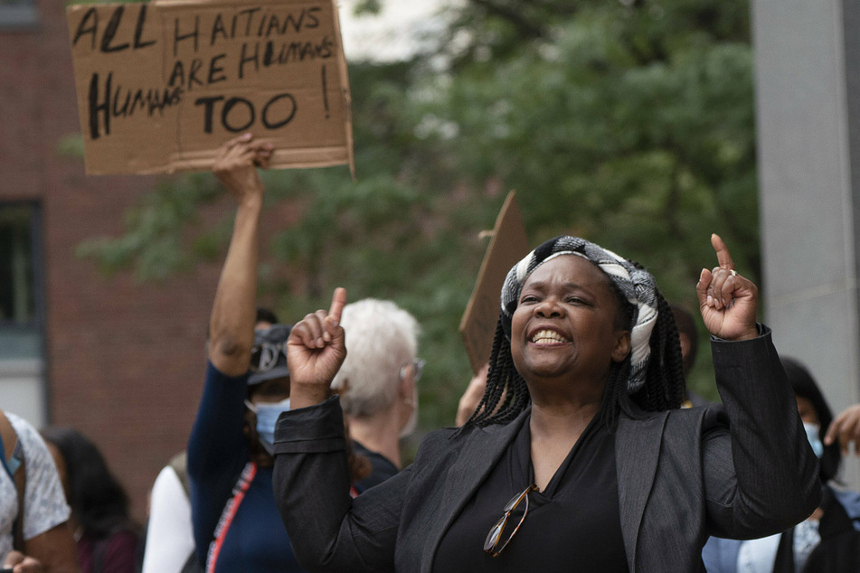 Protesters in Boston rally against the Biden administration's treatment of Haitian migrants.