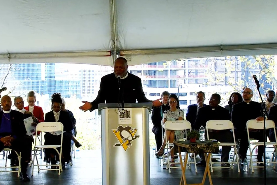 Bethel AME Church pastor Rev. Dr. Dale Snyder delivers remarks during a press conference announcing a historic land use agreement reached with the Pittsburgh Penguins.