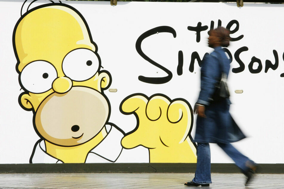 Ein Werbeplakat für den Film "Die Simpsons". Die gelben Figuren sind weltweit Kult.
