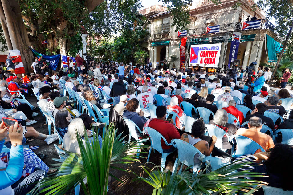 Members of the Nuestra America Convoy take part in an event at the Cuban Institute for Friendship with the Peoples in Havana on March 21, 2026.