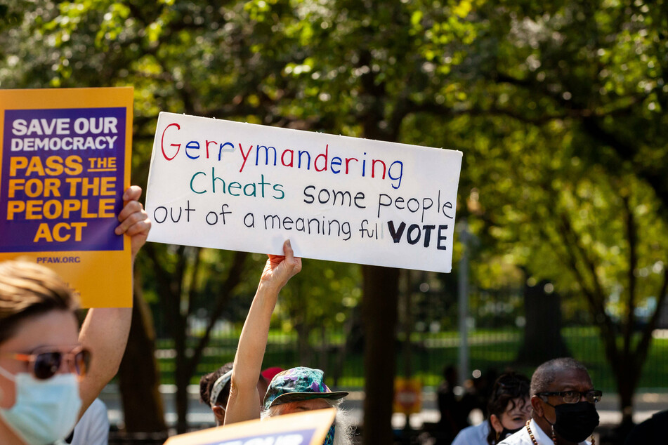 August 2021: Activists gather in front of the White House to protest unfair gerrymandering practices.