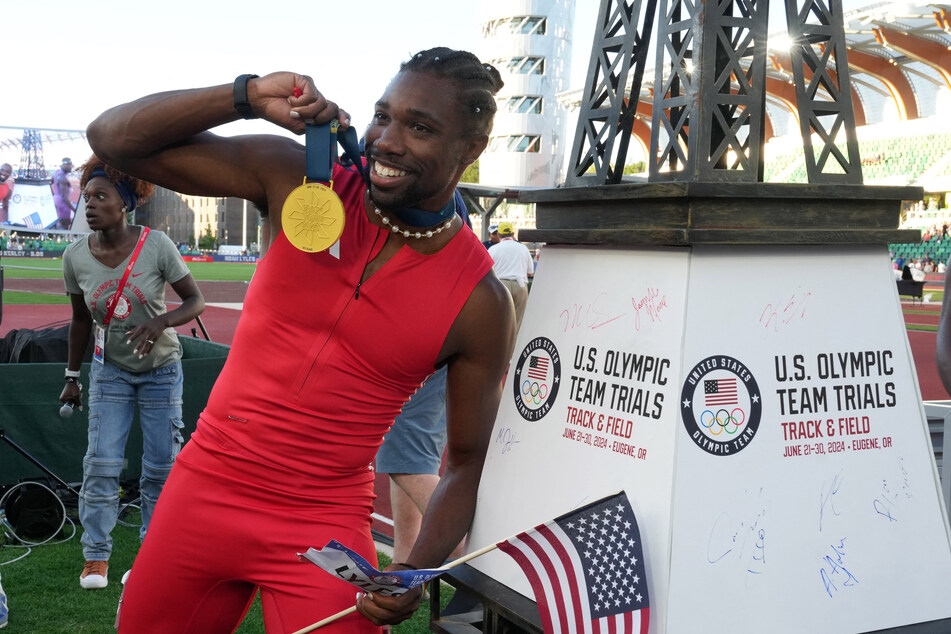 Noah Lyles poses with gold medal after winning the 100m in 9.83 during the US Olympic Team Trials at Hayward Field.
