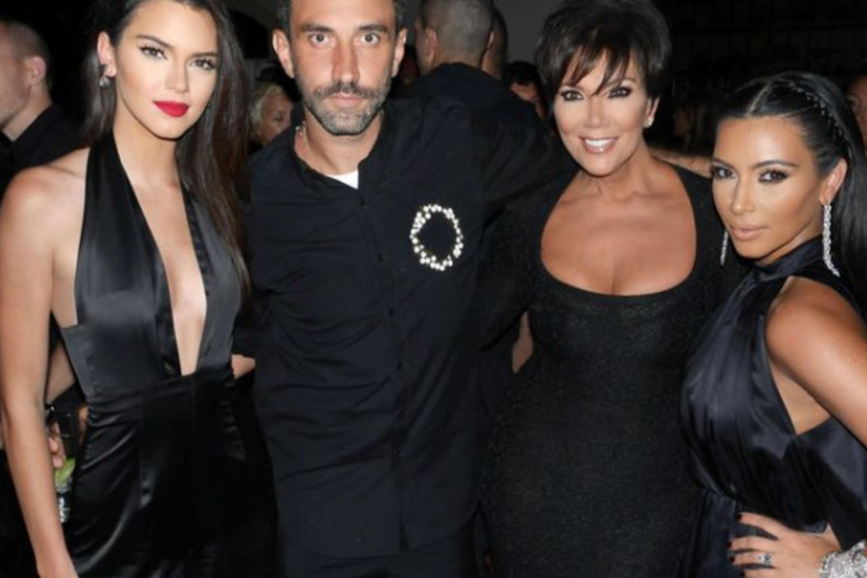 Kim Kardashian (r.) looked back at her 2014 era with rare snaps of Kris Jenner (second from r.), Kendall Jenner (l.), and designer Riccardo Tisci (second from l.).