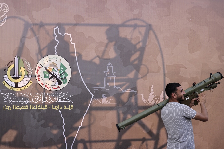 Hamas wages propaganda war on Israel as war crimes are posted to social media, experts say