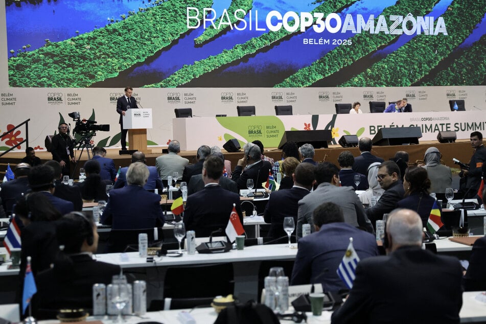 France's President Emmanuel Macron delivers a speech during the General Plenary of Leaders in the framework of the COP30 UN Climate Change Conference in Belém, Para State, Brazil, on November 6, 2025.