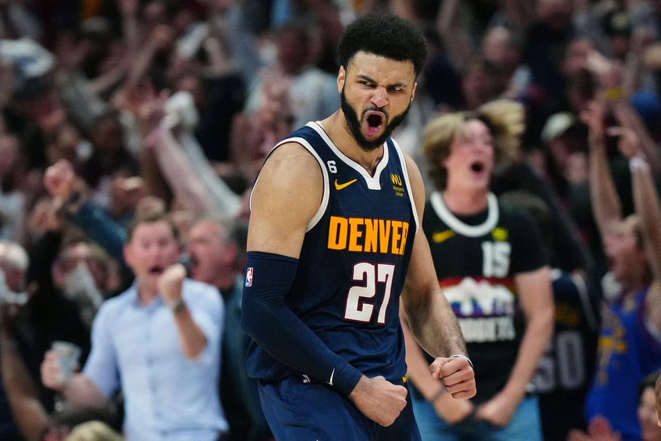 Denver Nuggets guard Jamal Murray reacts in the fourth quarter against the Los Angeles Lakers during Game 2 of the Western Conference Finals for the 2023 NBA playoffs at Ball Arena.