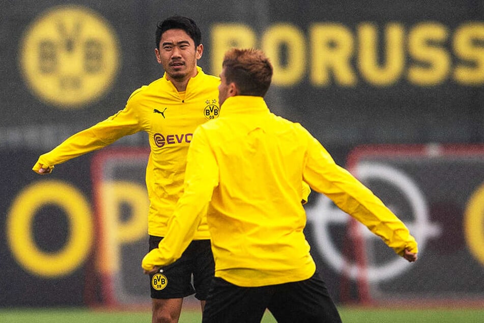 Shinji Kagawa (l.) steht aus rein sportlicher Sicht und trotz aller Verdienste beim BVB auf dem Abstellgleis.