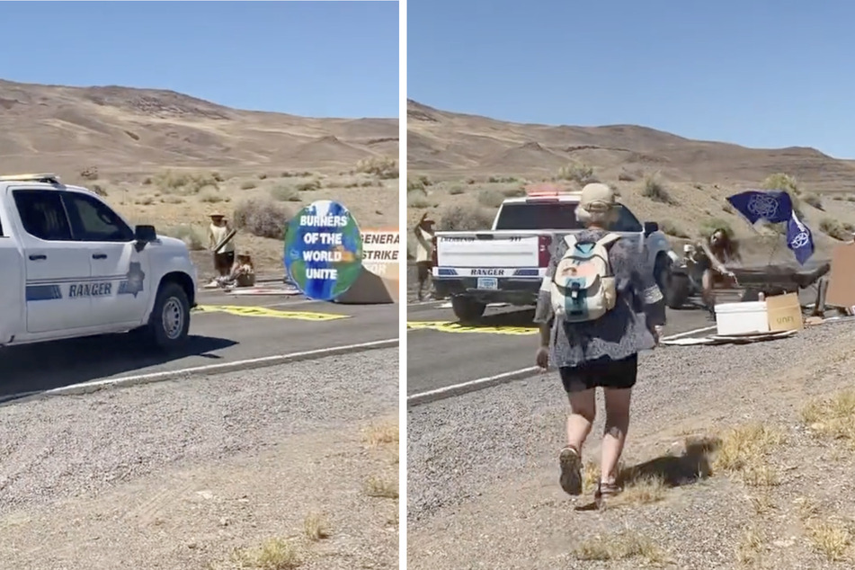 A Pyramid Lake Police Department officer breaks through a road barrier to the Burning Man festival erected by climate activists.