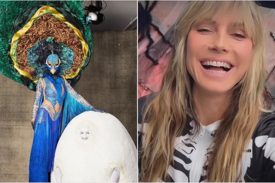 Heidi Klum gets a helping hand in over-the-top peacock costume for Halloween bash