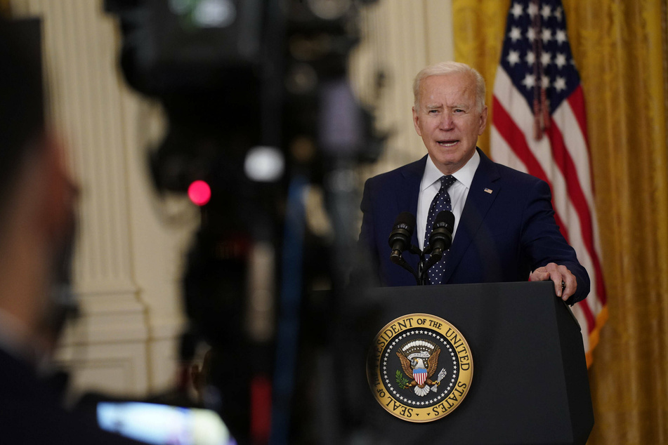 President Joe Biden speaks in the East Room of the White House on Thursday.